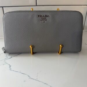 Authentic Prada Gray Leather wallet with mint interior